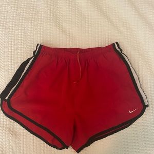 Red Nike shorts